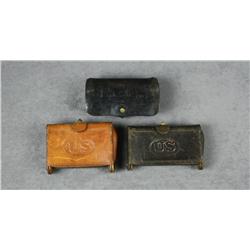 Lot of three U.S. military leather cartridge  boxes including a dark brown belt case for  .45-70 car