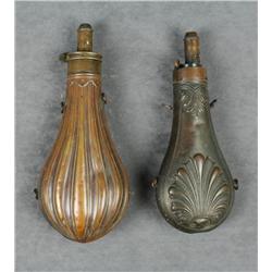 Lot of two large brass shotgun flasks, one  marked Am. Flask & Cap Co., both approx. 9”  overall and