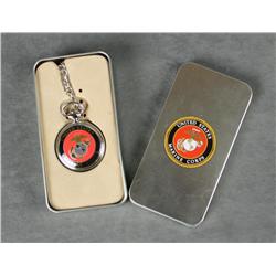 U.S.M.C. Commemorative pocket watch with  chain in metal box with Marine Corps insignia  on both the