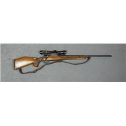 Sporterized bolt-action Mauser rifle, 7.65mm  cal., 24” barrel, blue finish, custom carved  wood sto