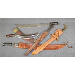 Bonanza lot of five machetes including a  Collins & Co. in tooled leather scabbard, a  wide bladed c