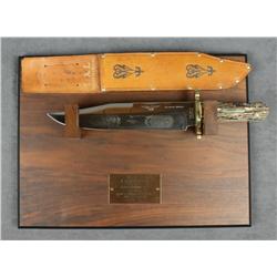 Large modern presentation Bowie knife,  approx. 14” overall with an approx. 10” blade  that is etche