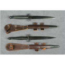 Pair of collectible British Sykes-Fairburn  military knives with leather sheaths; both in  overall v