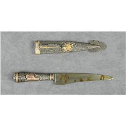 Fancy belt knife with matching fancy sheath  approx. 11-1/2” overall with an approx.  6-1/2” blade m