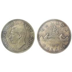 1937 $1 PCGS MS65, atractively toned.  Rare in GEM!