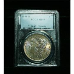 PCGS 1884-o Morgan Dollar graded Gem Uncirculated ms65  **RAINBOW TONED**