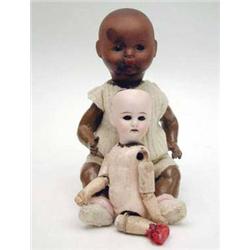 A German 2R138A black bisque head baby doll...