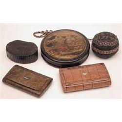 A 19th century circular papier mache snuff...