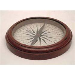 A 19th century portable compass with...