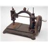 Image 1 : A primitive cast iron table top sewing...