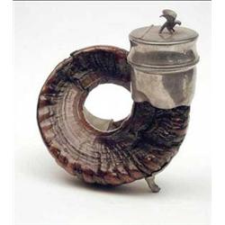 A rams horn snuff mull with pewter mounts...