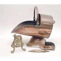 A Victorian copper coal scuttle, a coal...