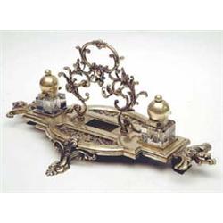 A Victorian cast brass desk stand fitted...