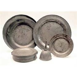 A pair of Georgian pewter chargers, 17ins, a...