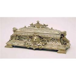 A late Victorian brass desk stand cast with...