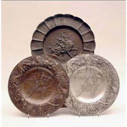 A pair of Chinese relief moulded wall...