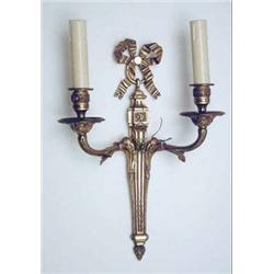 A suite of five ormolu wall lights, each...