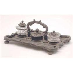 A 19th century bronze desk stand with cut...