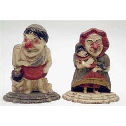 A pair of Victorian cast iron door stops...