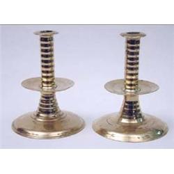 A pair of 17th century brass trumpet based...