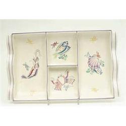 A Poole pottery polychrome hors d'oeuvres...