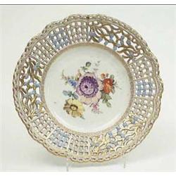 A late 19th century Meissen pierced cabinet...