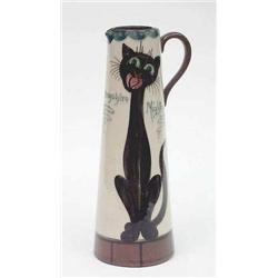 An early 20th century Devonware tapering...