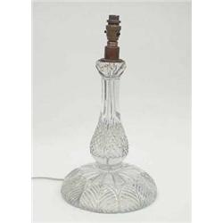 An early 20th century cut glass table lamp...