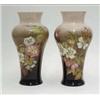 Image 1 : A pair of Royal Doulton faience vases...