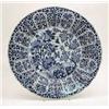 Image 1 : A Kang Hsi blue and white plate with dense...