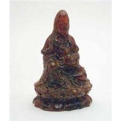 A Chinese amber figure of Kwan Yin, 5ins...