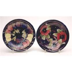 A Moorcroft dish with pansies, 7.5ins and...