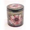 Image 1 : A Moorcroft cylindrical jar and cover with...