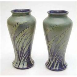 A pair of Moorcroft baluster vases with the...