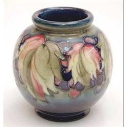 A Moorcroft globular vase with leaf and...