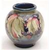 Image 1 : A Moorcroft globular vase with leaf and...