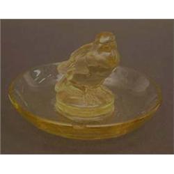 A Lalique yellow glass cendrier surmounted...