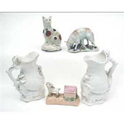 A Derby sheep on floral encrusted base,...