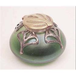 An Art Nouveau brass and iron mounted green...