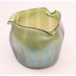 A Loetz blue green iridescent glass triform...
