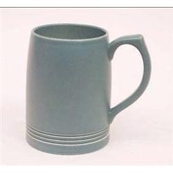 A Wedgwood Keith Murray green glazed mug of...