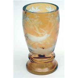 A Bohemian amber flash vase engraved with a...