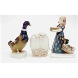 A Rosenthal figure of a girl feeding ducks,...