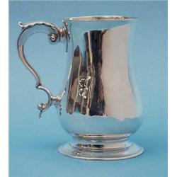 A George III silver baluster mug with...