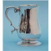 Image 1 : A George III silver baluster mug with...