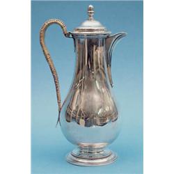 A George III silver hotwater pot of baluster...