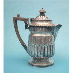 A late Victorian demi fluted silver hot...