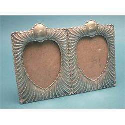 A Victorian silver double photograph frame...