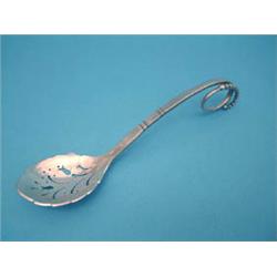 A Georg Jensen silver sifter spoon with...