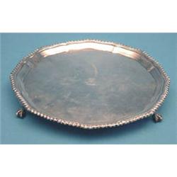 A George V silver salver with gadroon rim...